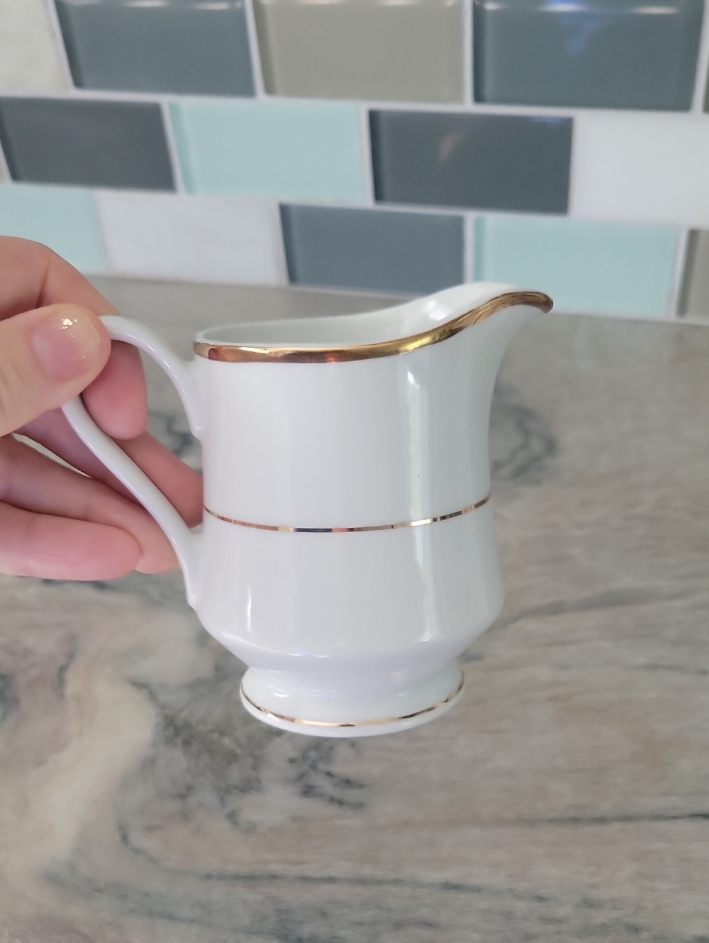 Crescent White Porcelain Creamer with Gold Marking